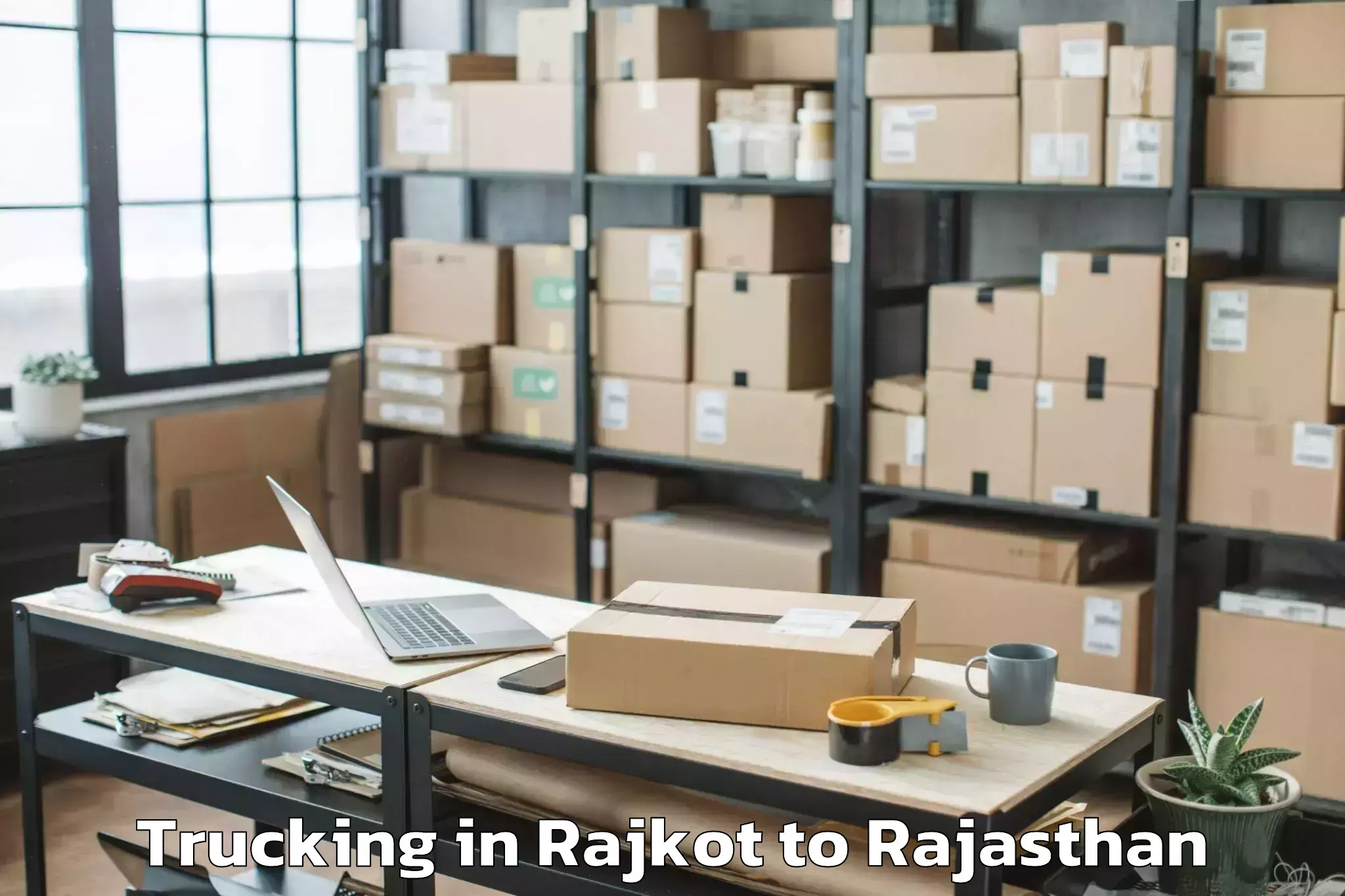 Book Rajkot to Jamwa Ramgarh Trucking